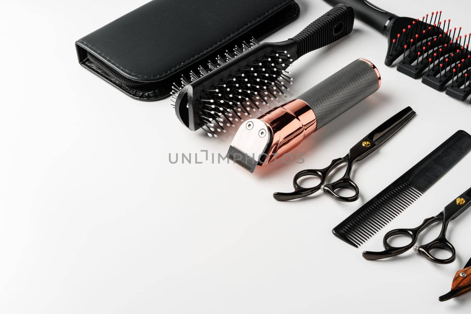 Set of barber tools for haircut on gray background flat lay studio shot