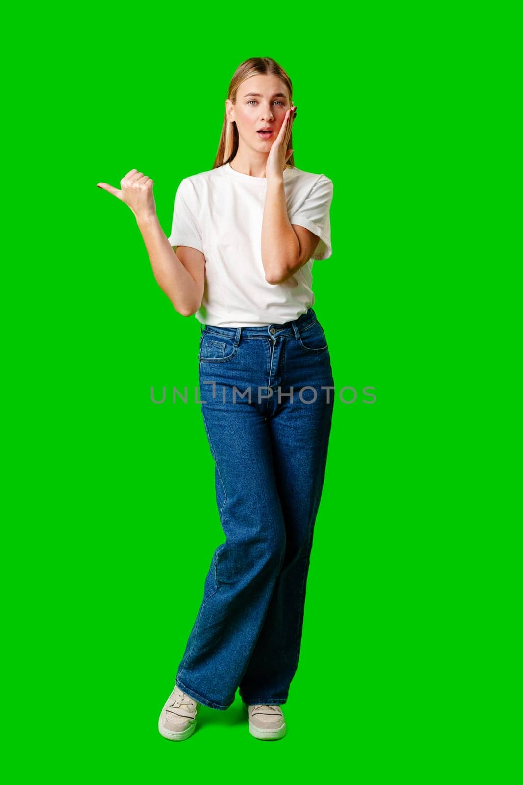 Young Woman in White T-shirt Making a Surprised Face by Fabrikasimf