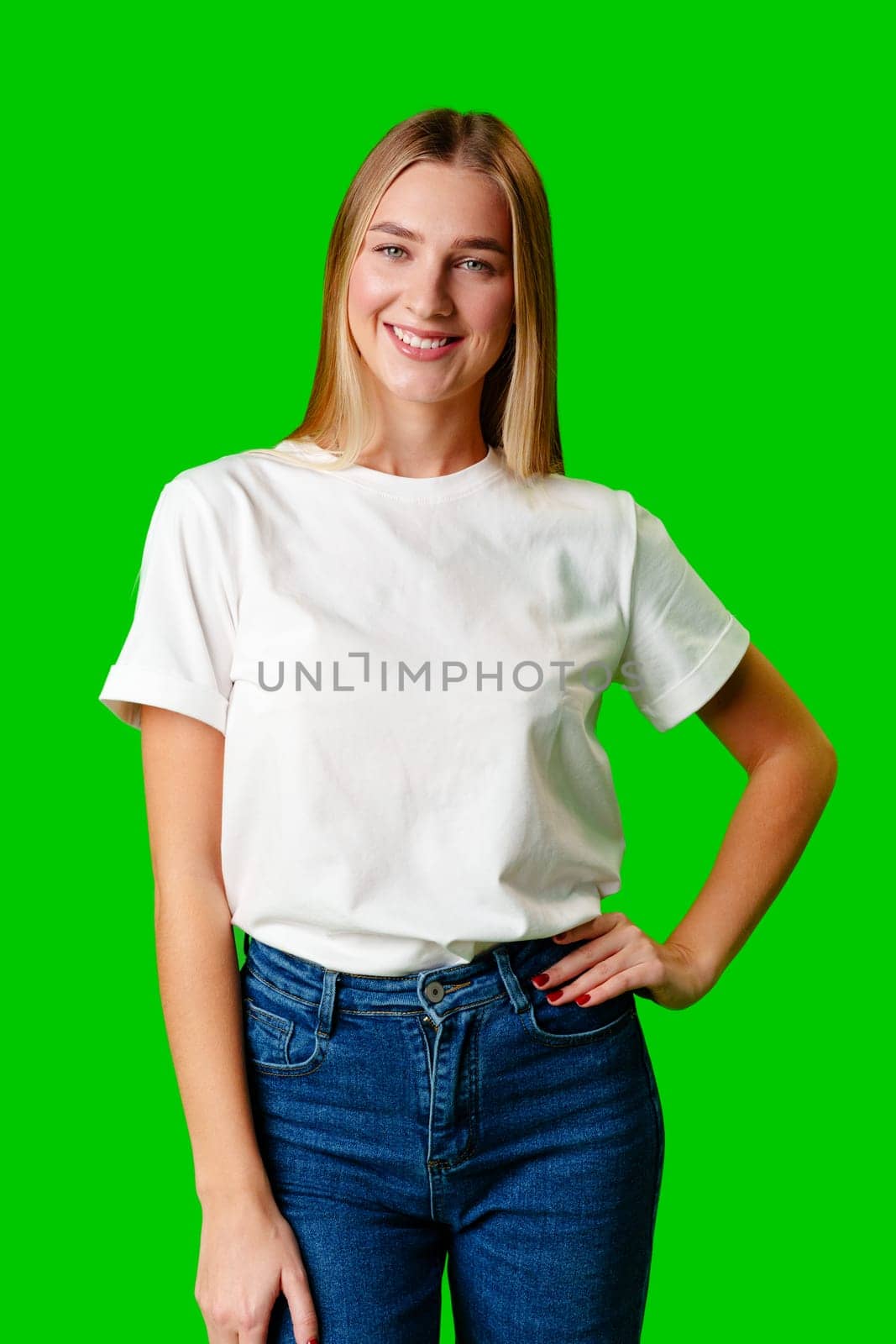 Young Woman in White Shirt Posing for Picture against green background by Fabrikasimf