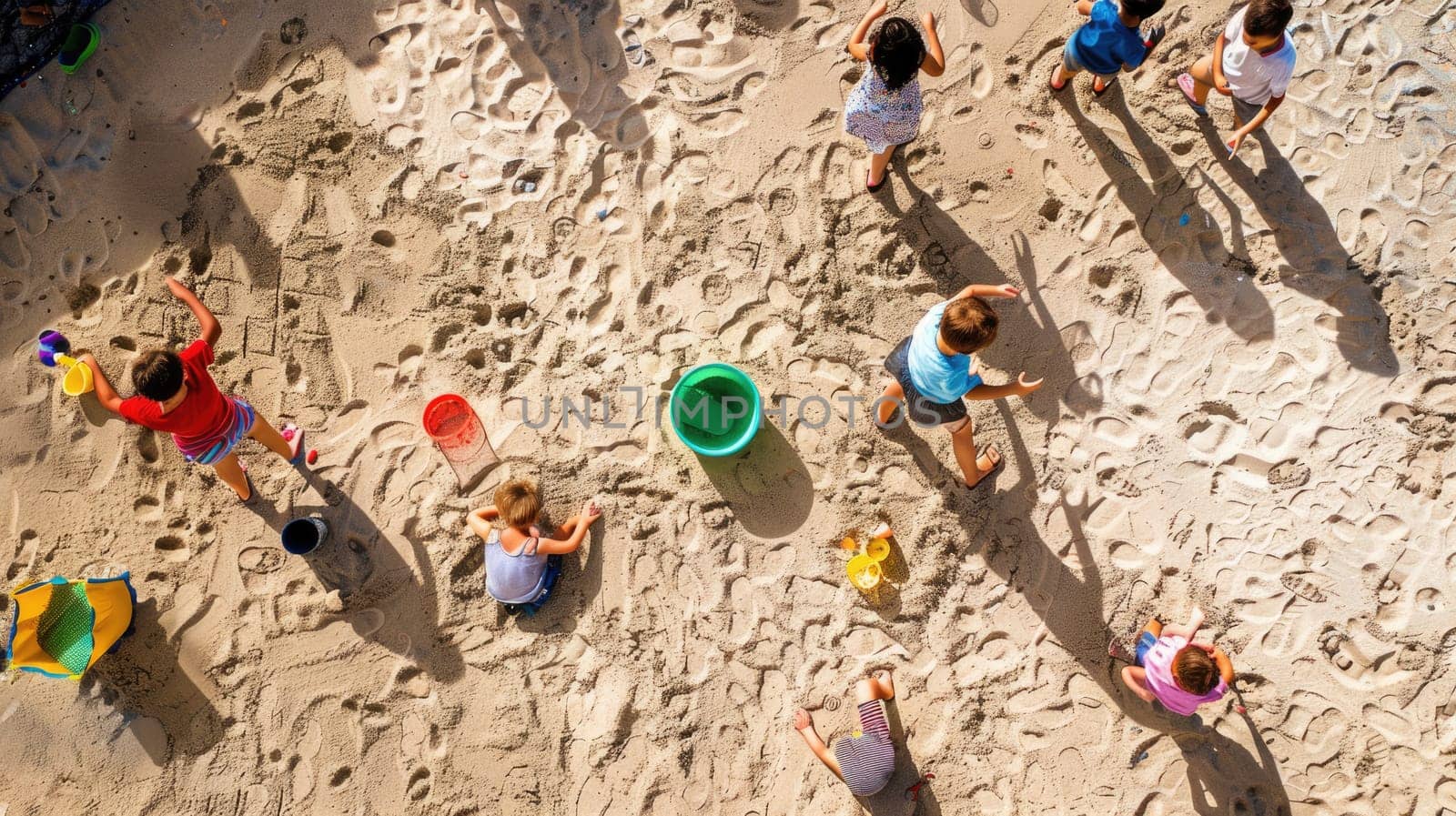 A group of children are leisurely playing in the sand on a beach, creating art and exploring the rock landscape. The beach offers a perfect setting for recreation and adventure AIG50