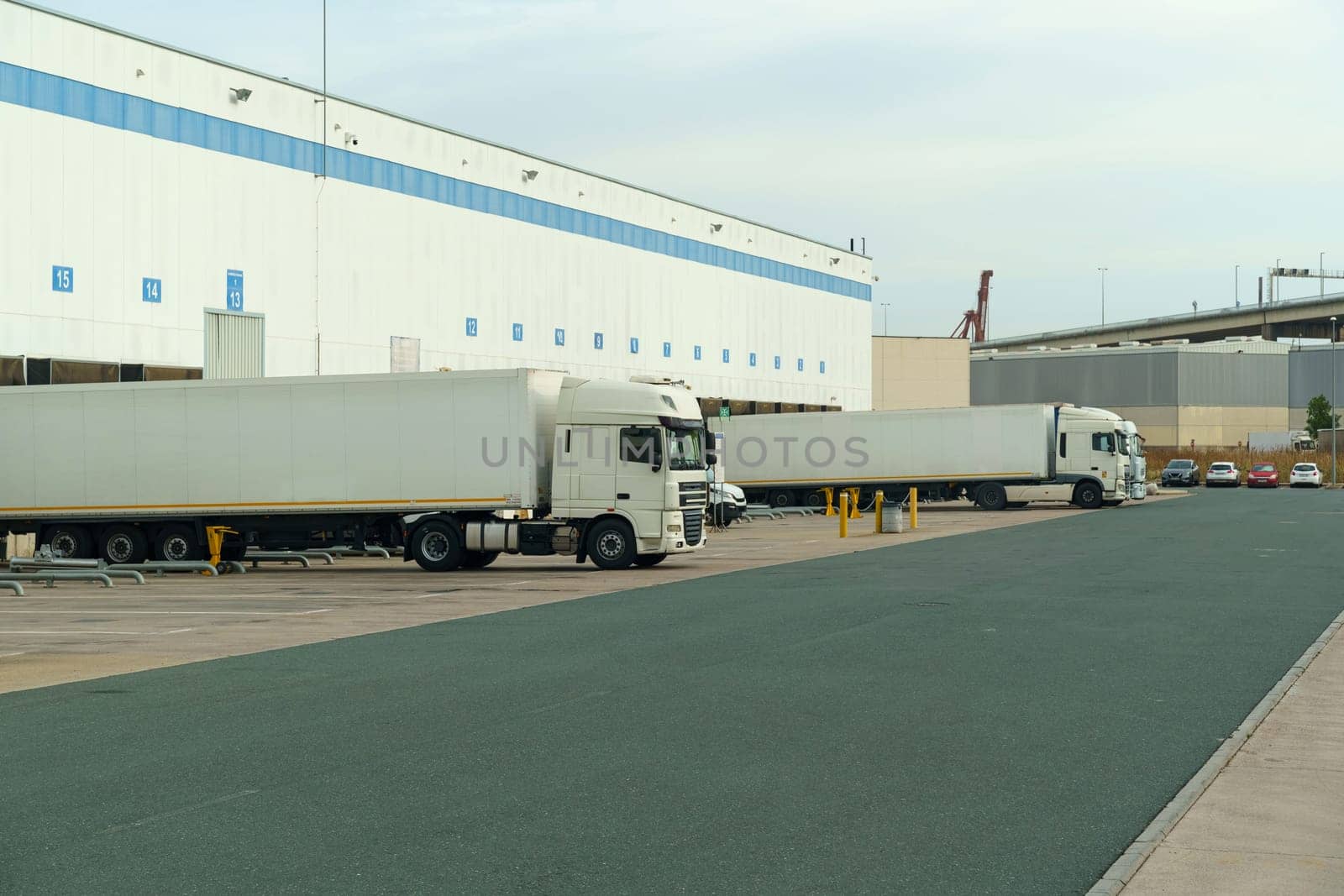 Line of Trucks Parked in Front of Building by Sd28DimoN_1976