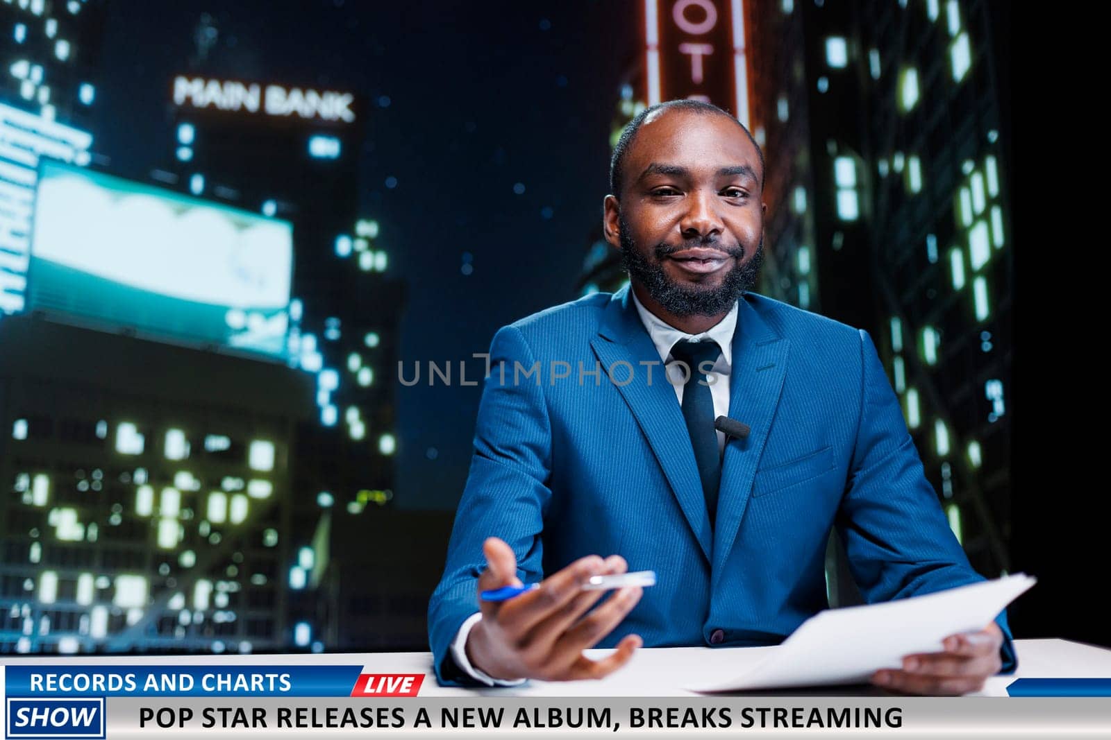 Reporter talks about new music launch, presenting successful pop star album breaking the top charts and streaming records. Night show host covering media and entertainment segment.