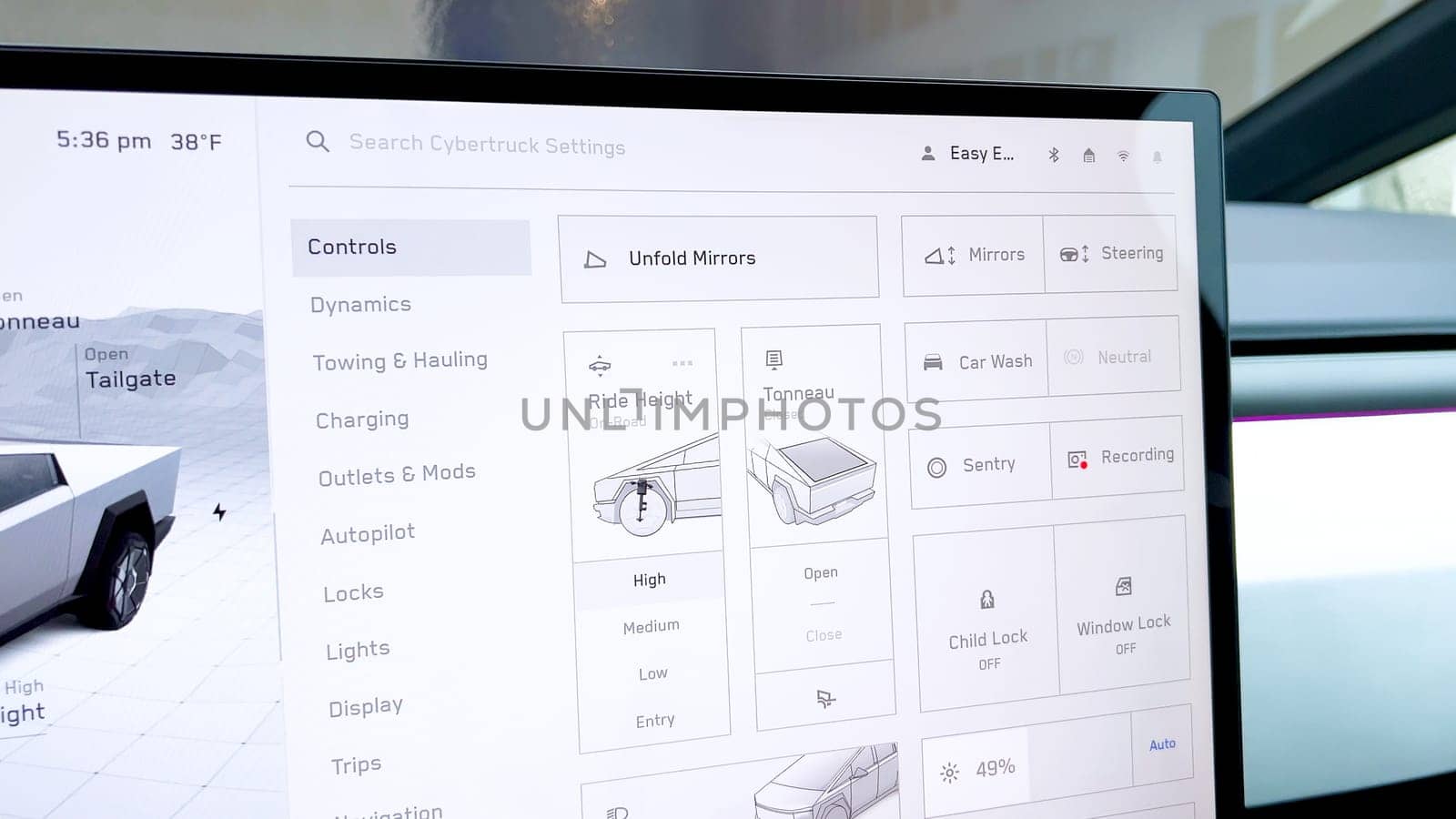 Denver, Colorado, USA-April 28, 2024- Highlighting the Tesla Cybertruck state-of-the-art touchscreen interface, this image shows the detailed control panel that allows drivers to adjust vehicle settings such as ride height, mirror positioning, and more, enhancing the driving experience with modern technology.