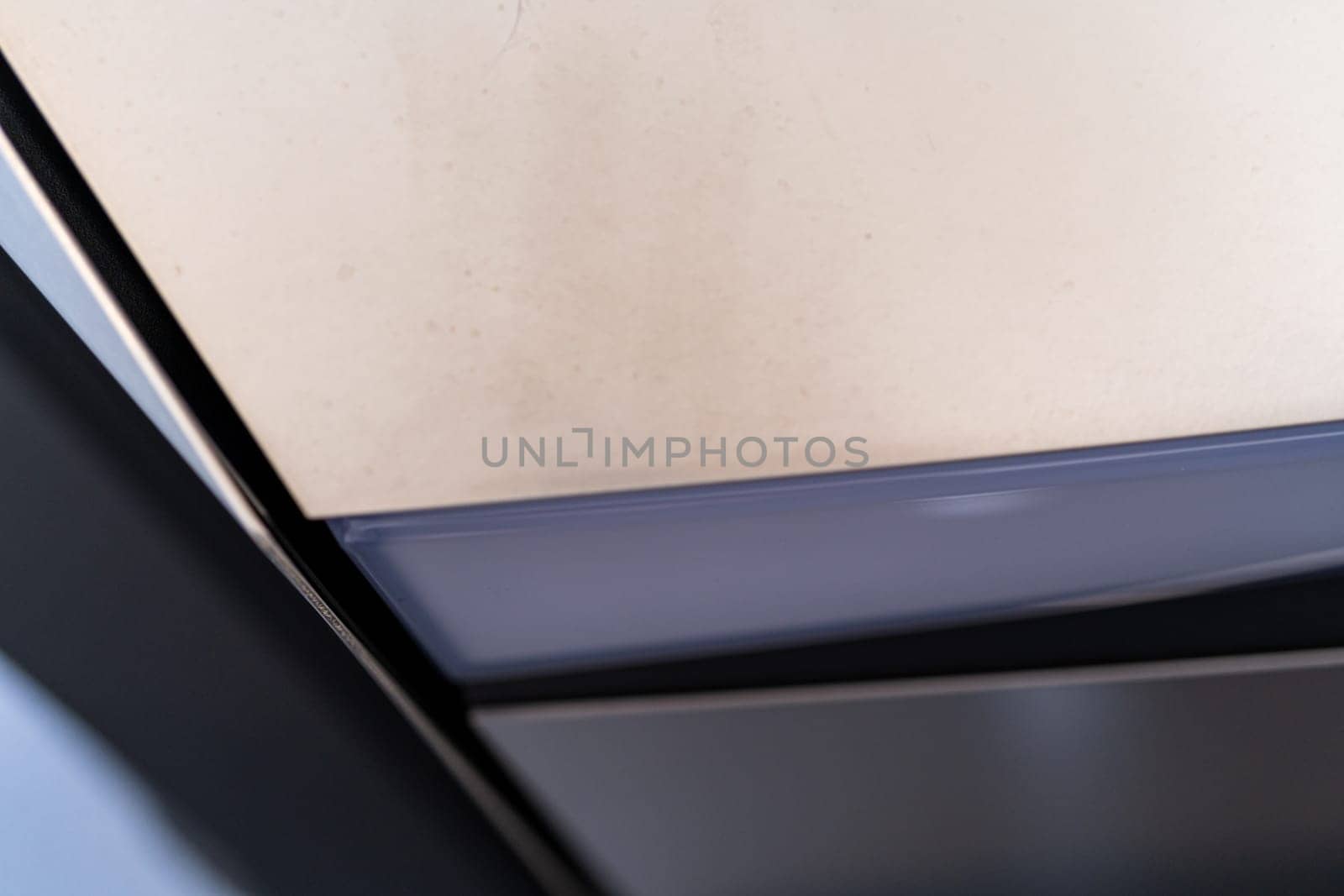 Denver, Colorado, USA-May 5, 2024-This image captures the streamlined and minimalistic design detail of the Tesla Cybertruck exterior, focusing on the sleek and subtle curvature that showcases the futuristic aesthetic of this innovative electric vehicle.