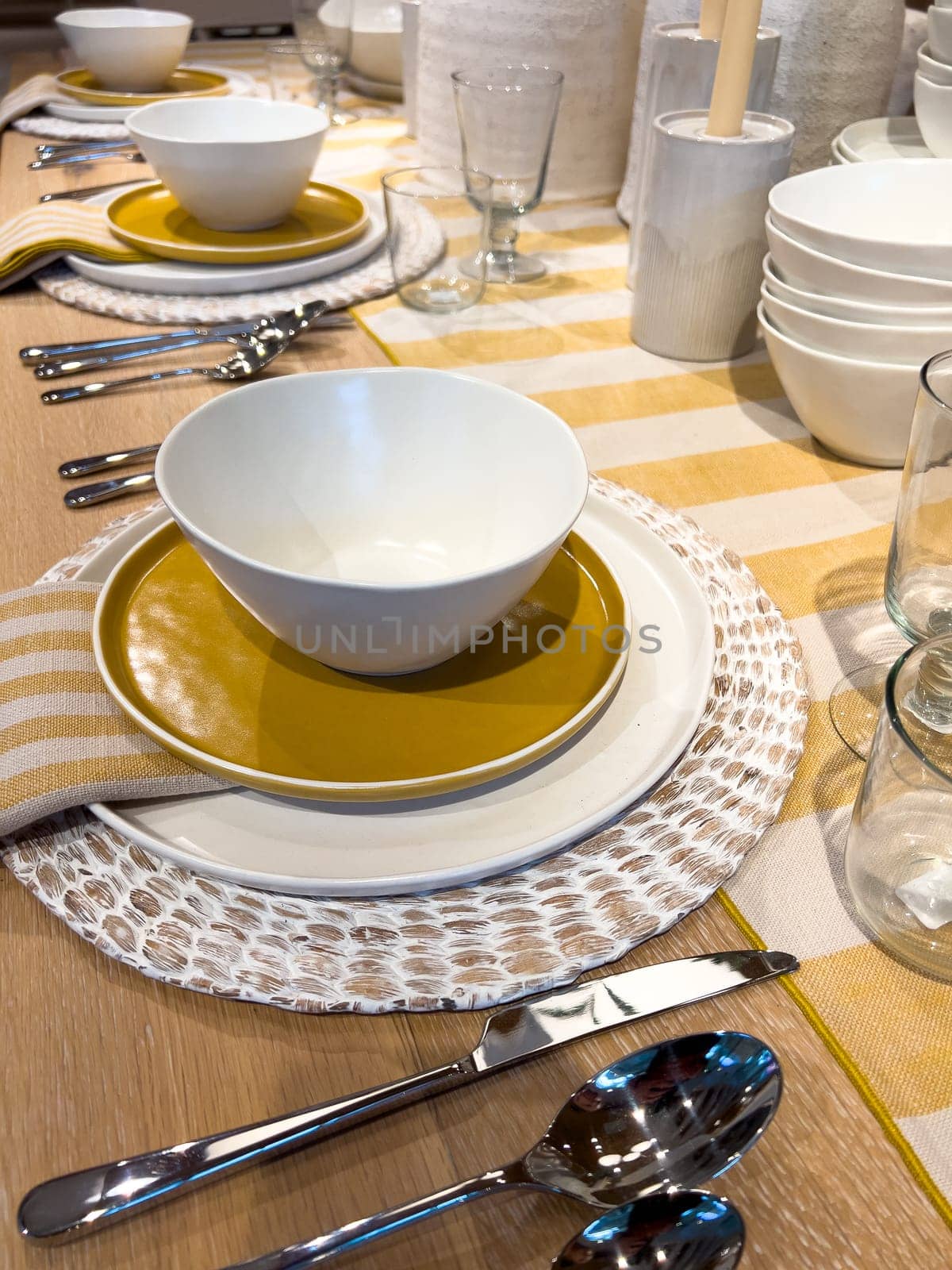 Elegant Dining Table Setting with Modern Tableware by arinahabich