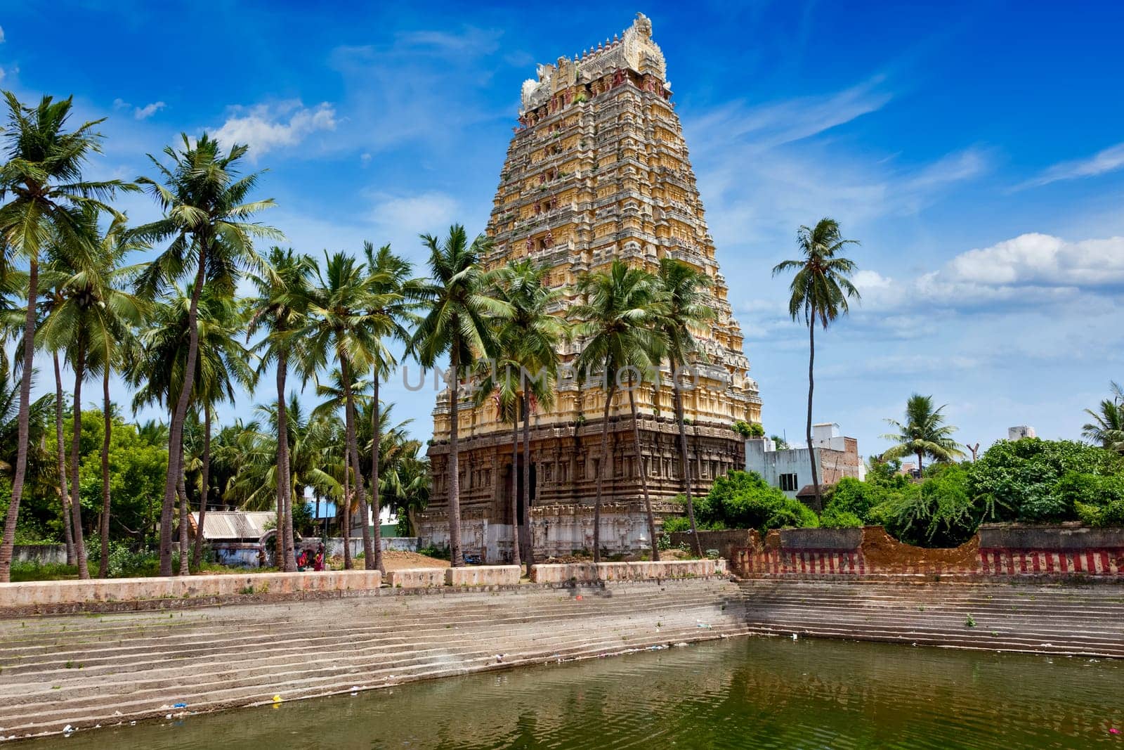 Gopura tower and temple tank of Lord Bhakthavatsaleswarar Temp by dimol
