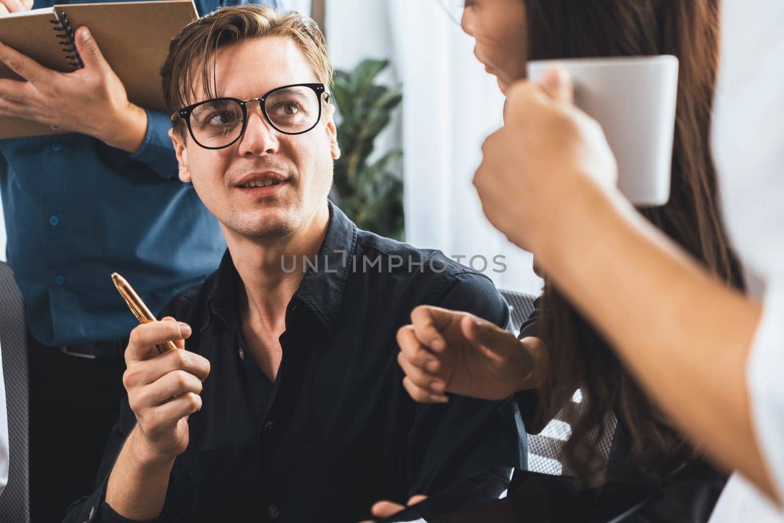 Group of diverse office worker employee working together on strategic business marketing planning in corporate office room. Positive teamwork in business workplace concept. Prudent