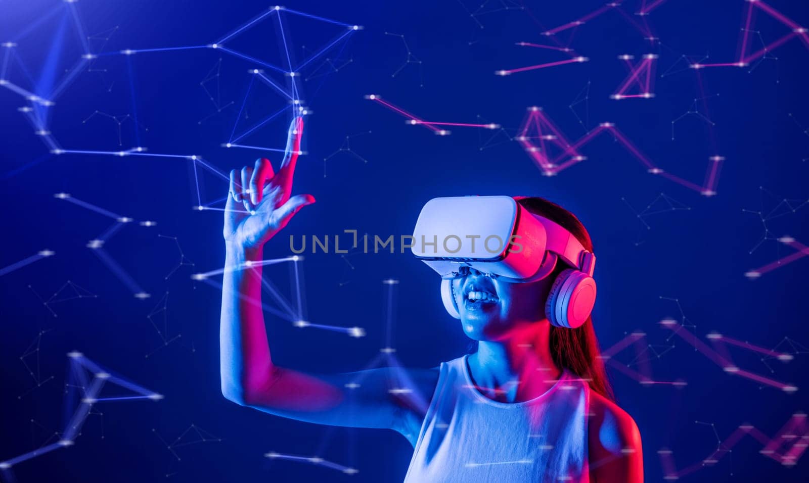 Female stand in cyberpunk neon light wear white VR headset and tank top connect metaverse, future cyberspace technology, She use index finger touch hologram object of virtual reality. Hallucination.