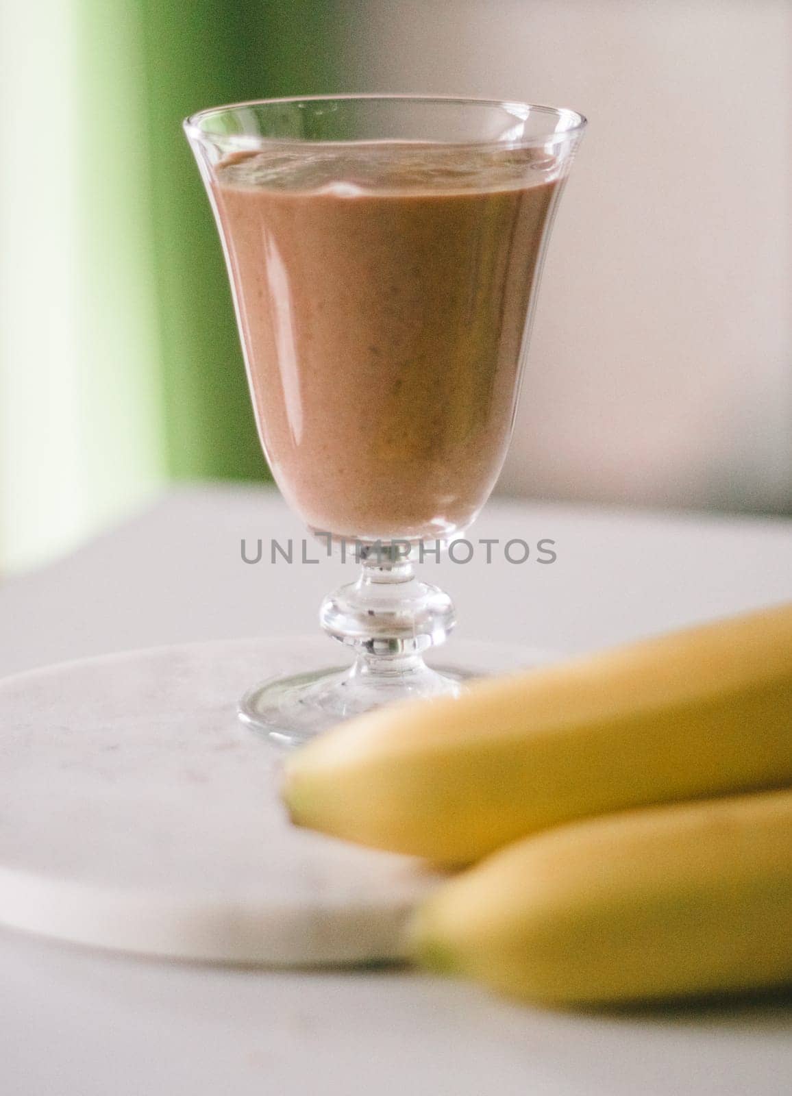 banana cocoa smoothie - healthy eating recipe styled concept, elegant visuals