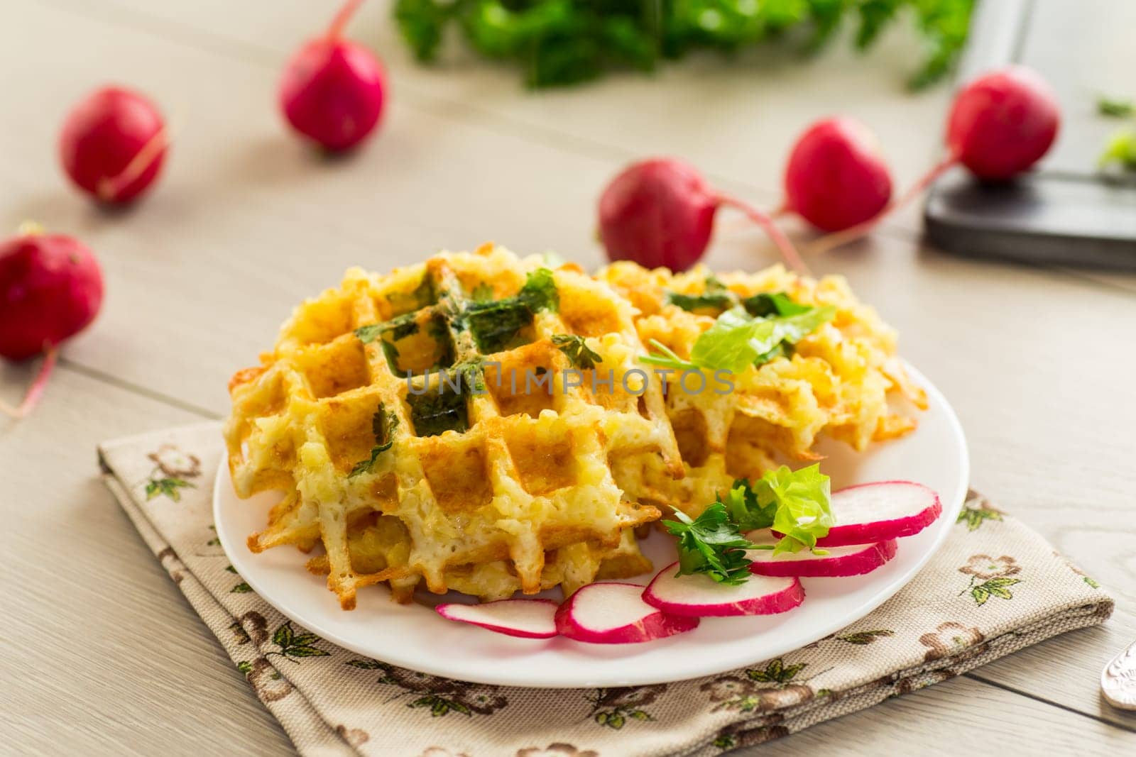 fried crispy vegetable potato waffles .