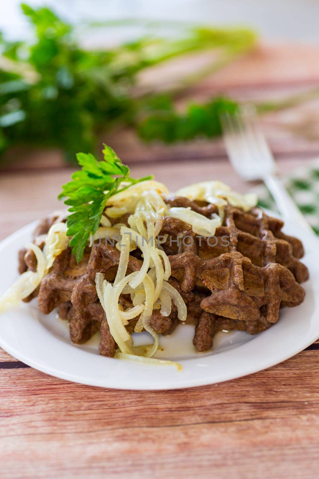 fried liver waffles with onions and herbs by Rawlik