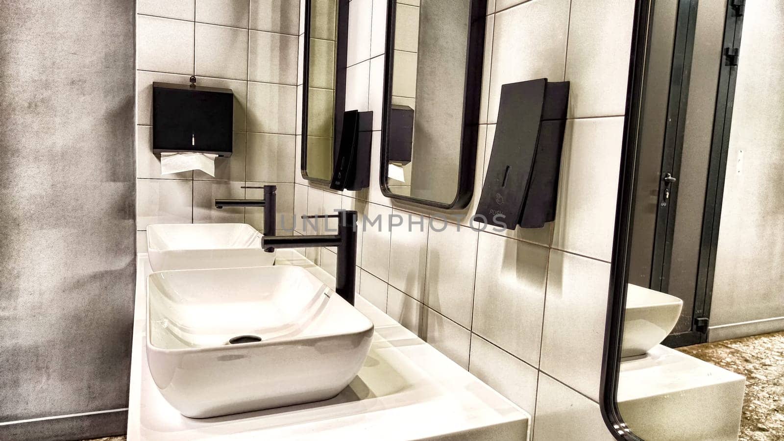 Modern bathroom interior with sink and mirror. Modern Bathroom Interior With Marble Sink and Wall Mirror by keleny