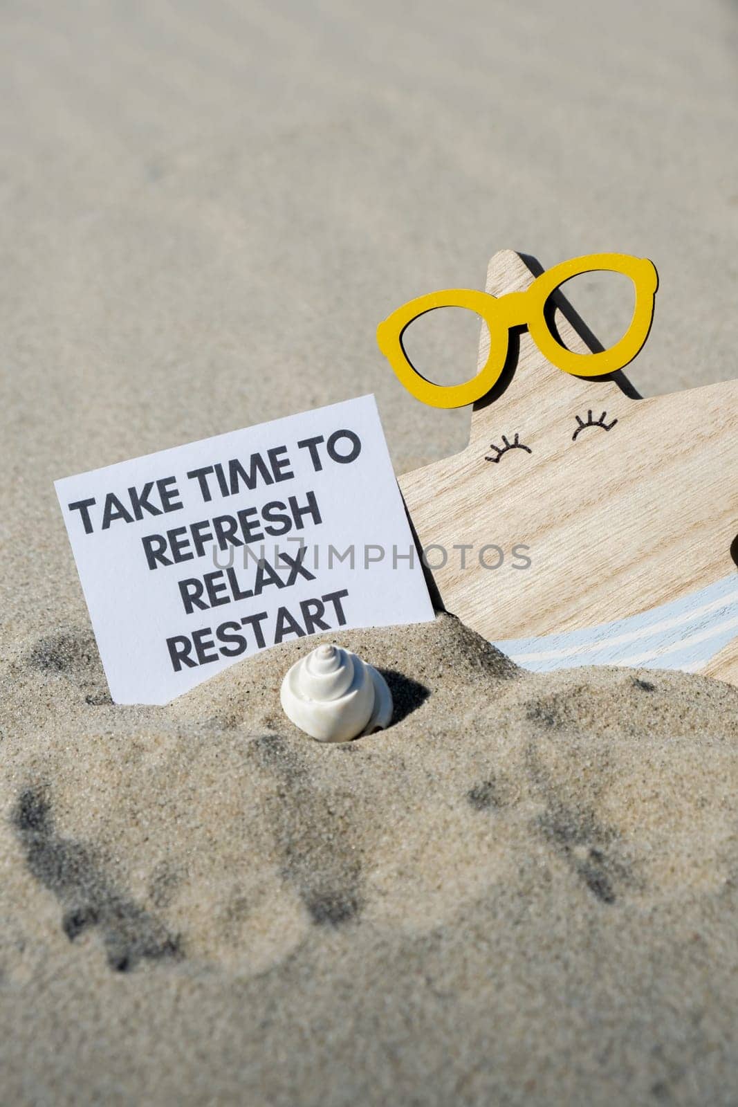 TAKE TIME TO REFRESH RELAX RESTART text on paper greeting card on background of funny starfish in glasses summer vacation decor. Sandy beach sun coast. Slowing-down, enjoying the moment, good moments, slow life Holiday concept postcard. Getting away Travel Business concept