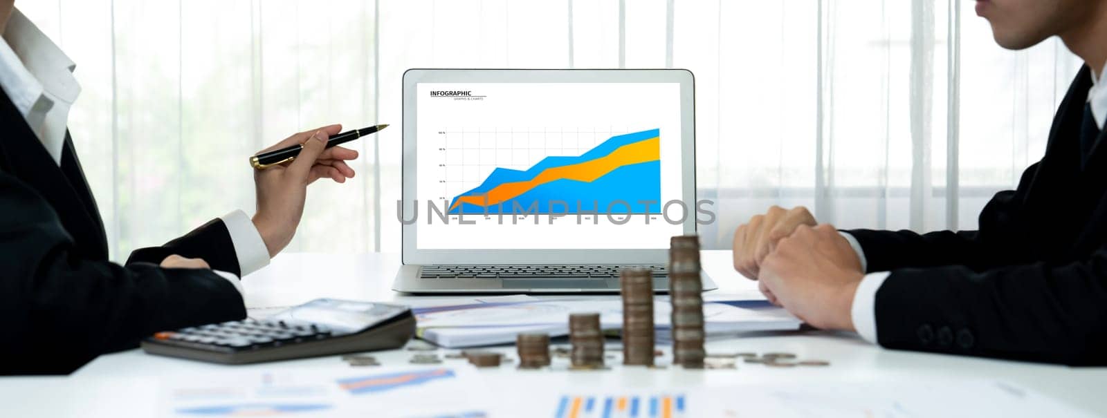 Business intelligence analyst use BI software on laptop to analyze financial data dashboard with growth stack coin symbolize business technology make investment decision in panorama. Shrewd
