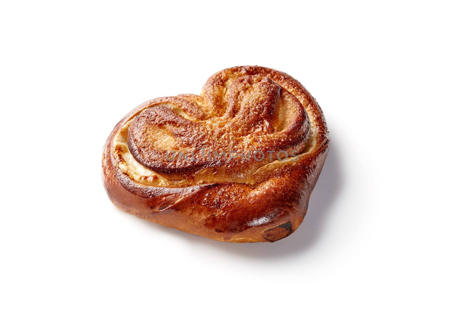 Fluffy golden sugar-dusted sweet bun filled with delicate custard, traditional Eastern European pastry, presented on white background