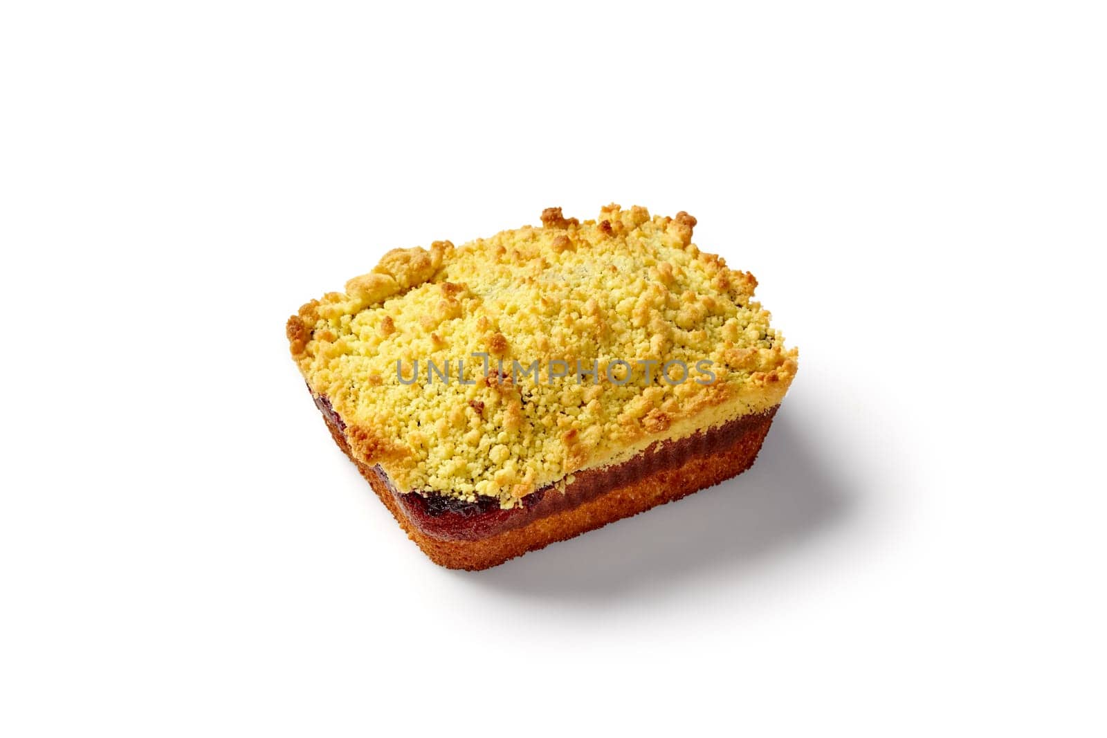 Scrumptious crumble pie with rich golden-brown topping and berry jam filling, presented against white backdrop