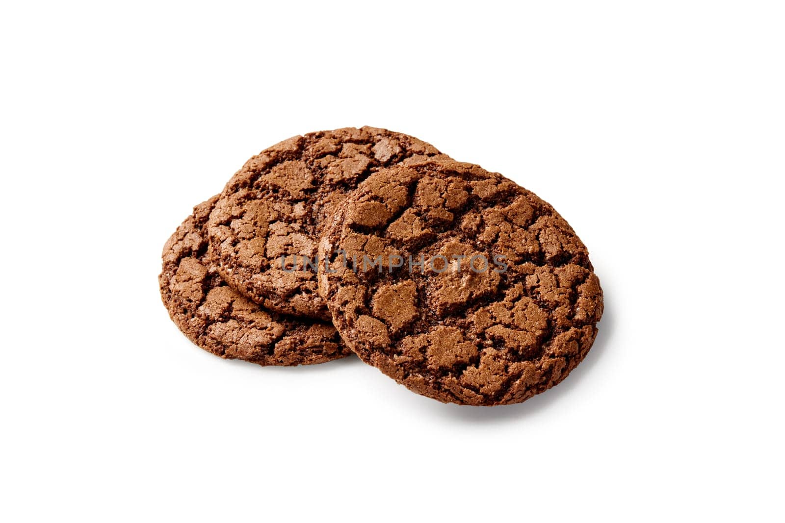 Classic chocolate sugar cookies, crunchy rich chocolatey flavor dessert with cracked surface, isolated on white background