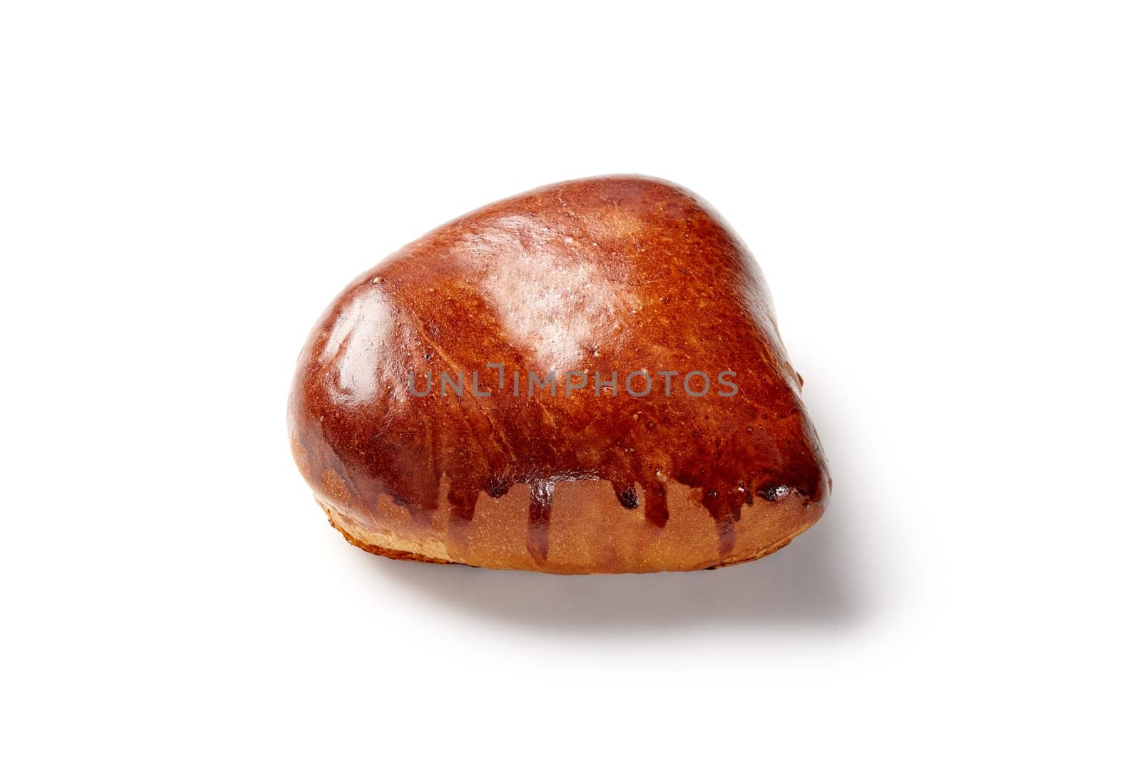 Shiny glazed pastry bun with sweet or savory filling presented on white background, ideal for snack or breakfast