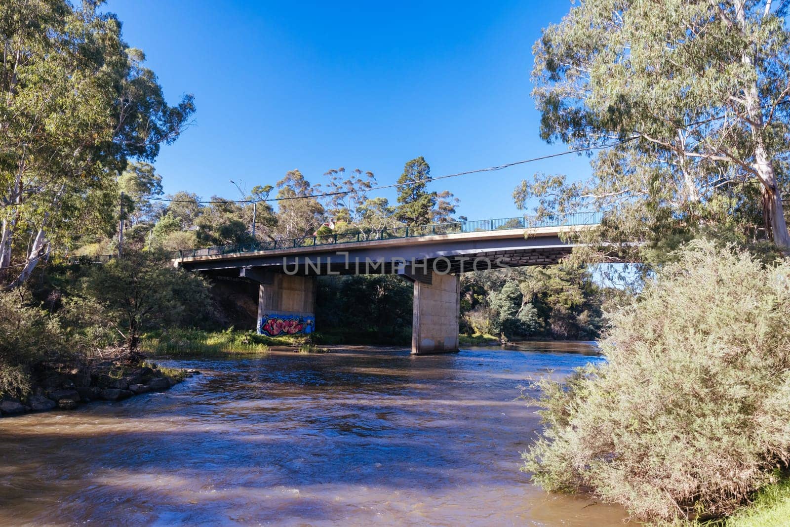 Warrandyte River Reserve and Kangaroo Ground-Warrandyte Rd bridge on a cool autumn day in Warrandyte, Victoria, Australia.