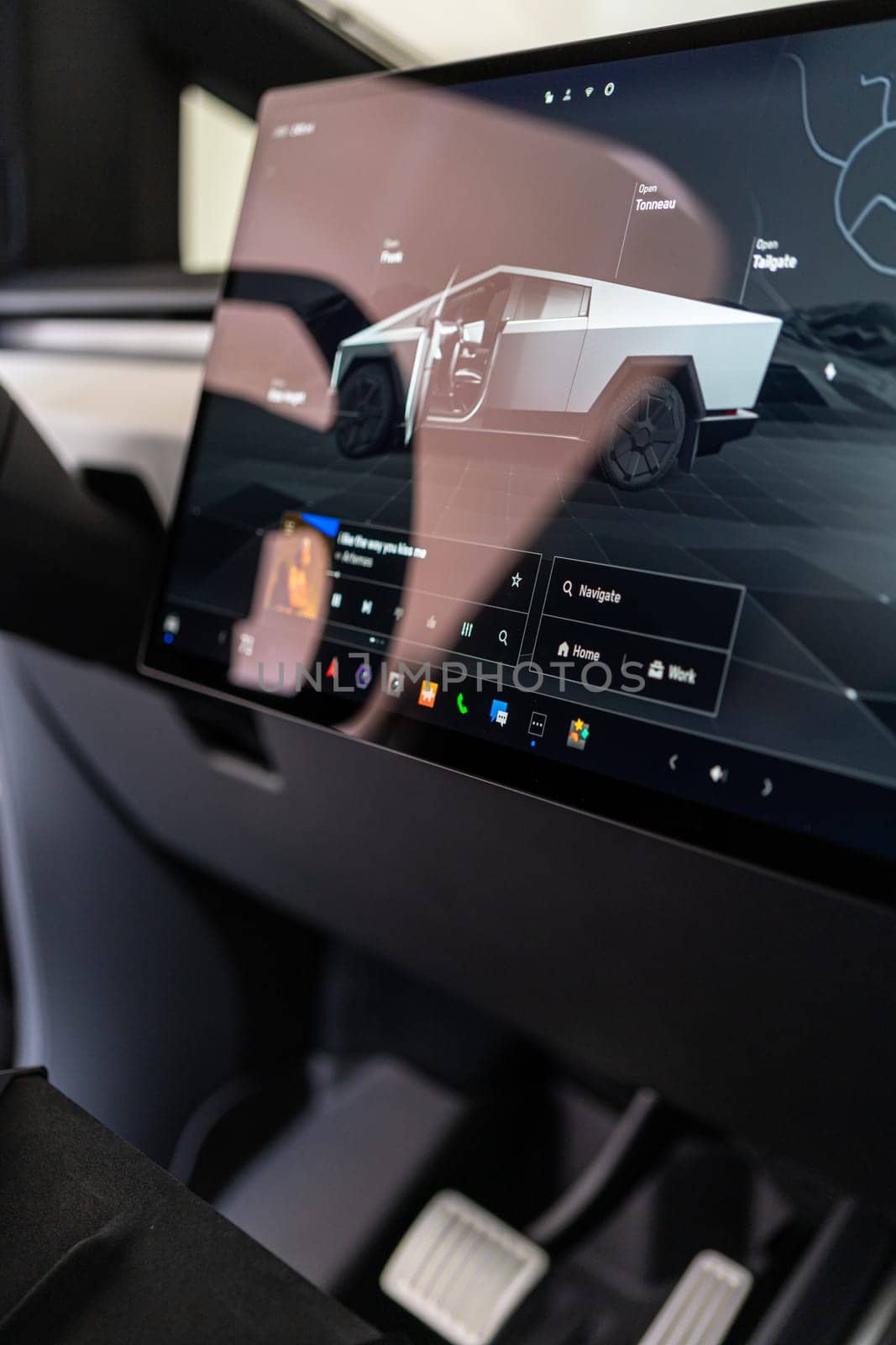 Sleek Interior of Tesla Cybertruck Featuring Futuristic Dashboard by arinahabich