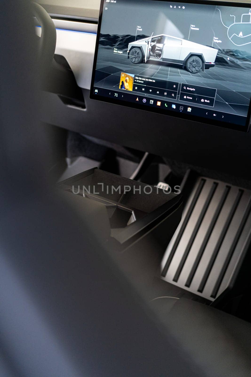 Sleek Interior of Tesla Cybertruck Featuring Futuristic Dashboard by arinahabich