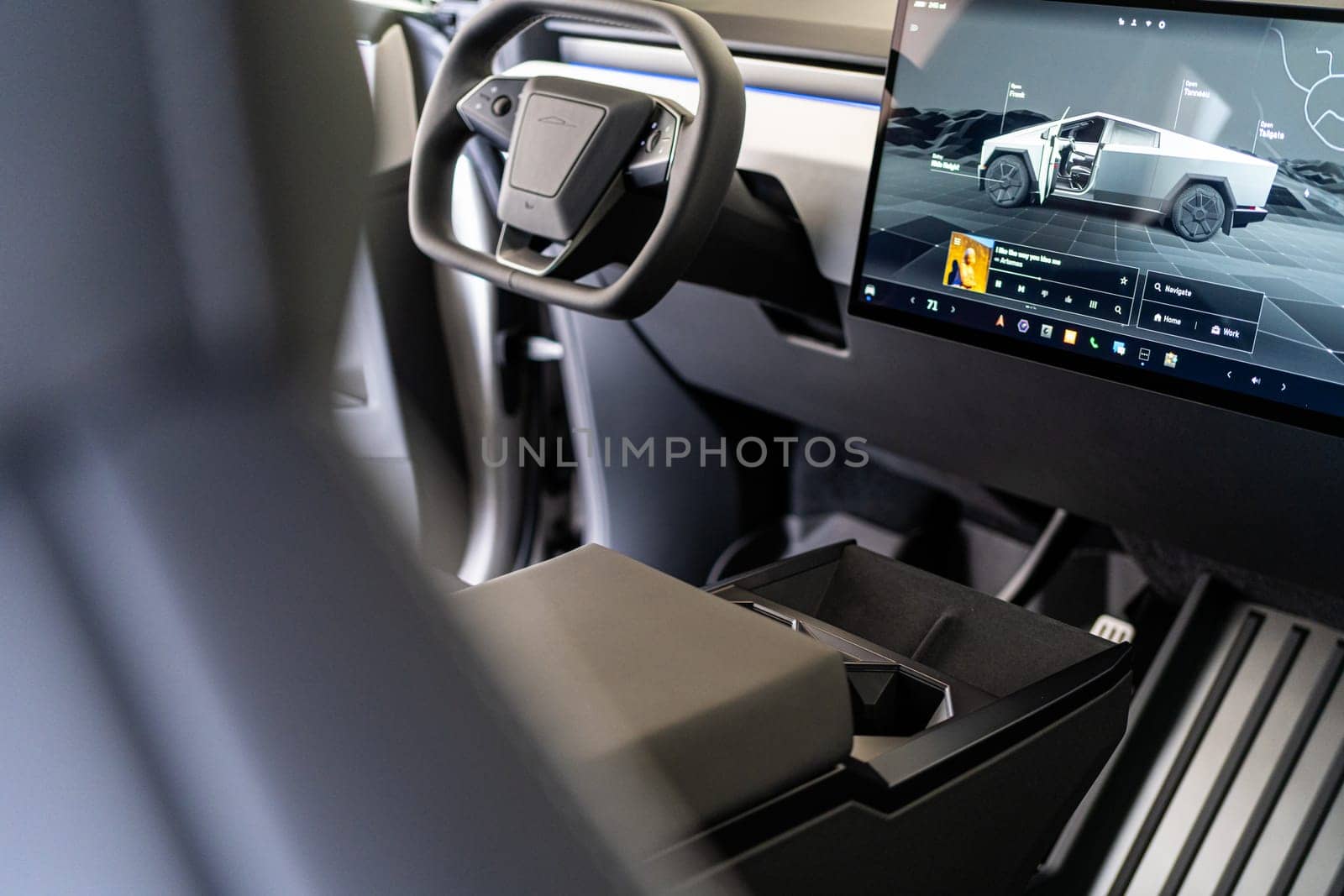 Sleek Interior of Tesla Cybertruck Featuring Futuristic Dashboard by arinahabich