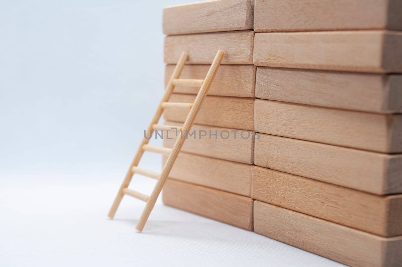 Ladder on a wooden blocks with customizable space for text.