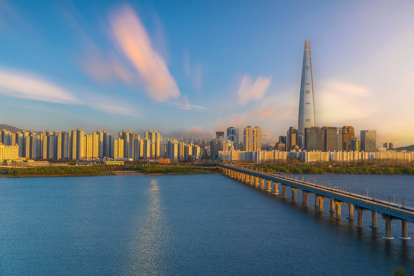 Skyline of seoul, the capital city of south korea with Han River at sunset