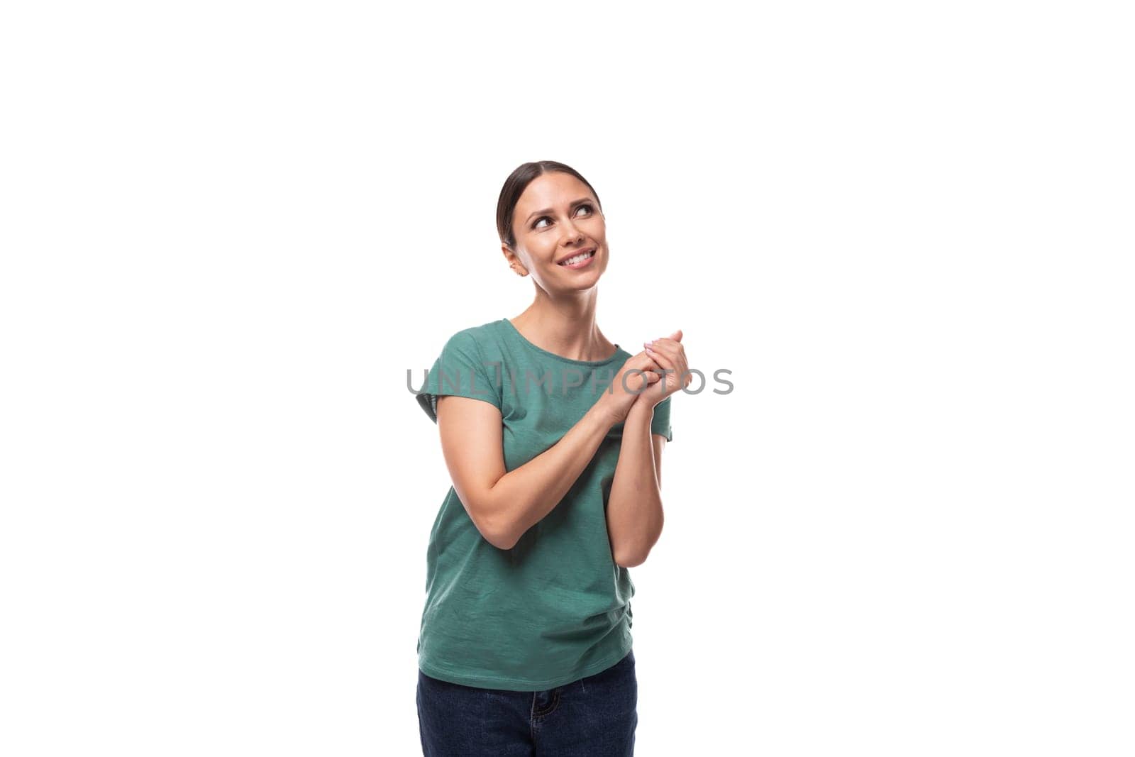 young brunette woman in love with collected hair is dressed in a basic t-shirt and jeans by TRMK