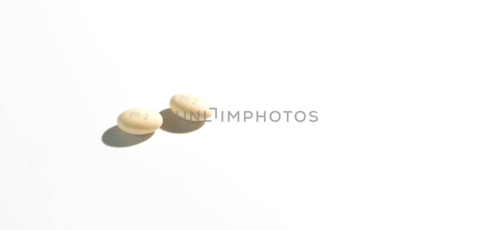 Banner Isolated Progesterone Pill, Capsule During Pregnancy On White Background. Dose Of Medications treats irregular menstrual cycle, prevents thicknessing the lining of uterus, Horizontal Copyspace