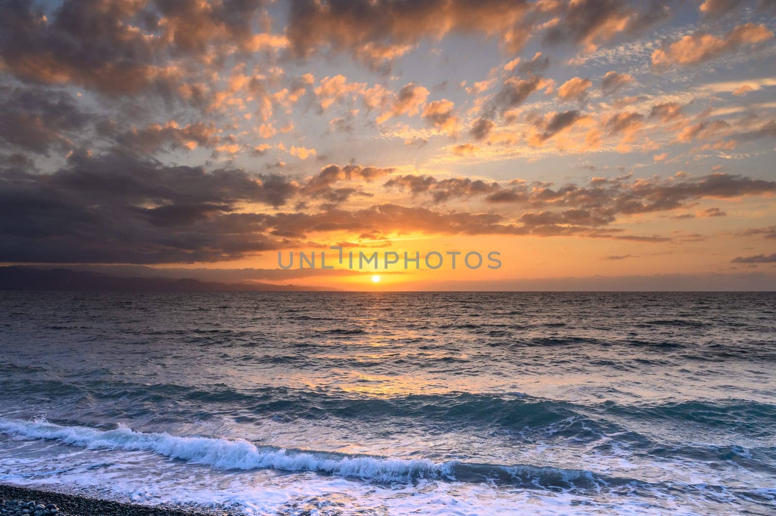 Sunset on Mediterranean Sea. Cloudy day.3