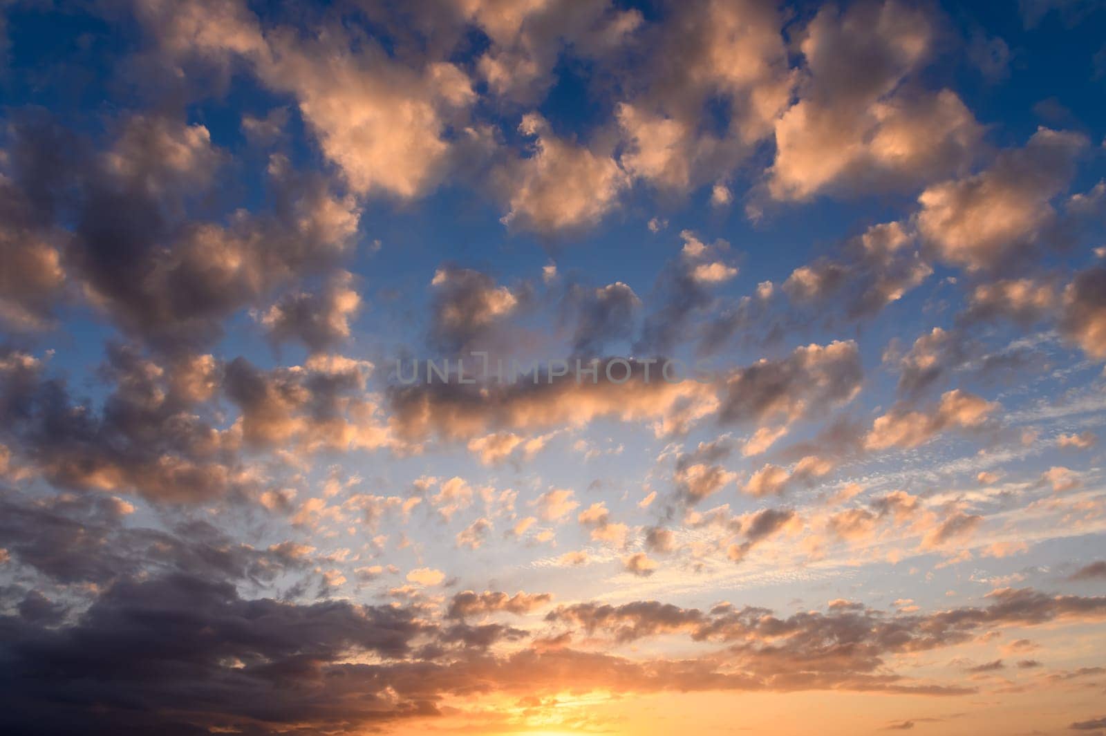 Dramatic Colorful Sunset Sky over Mediterranean Sea. Clouds with Sunrays. 1