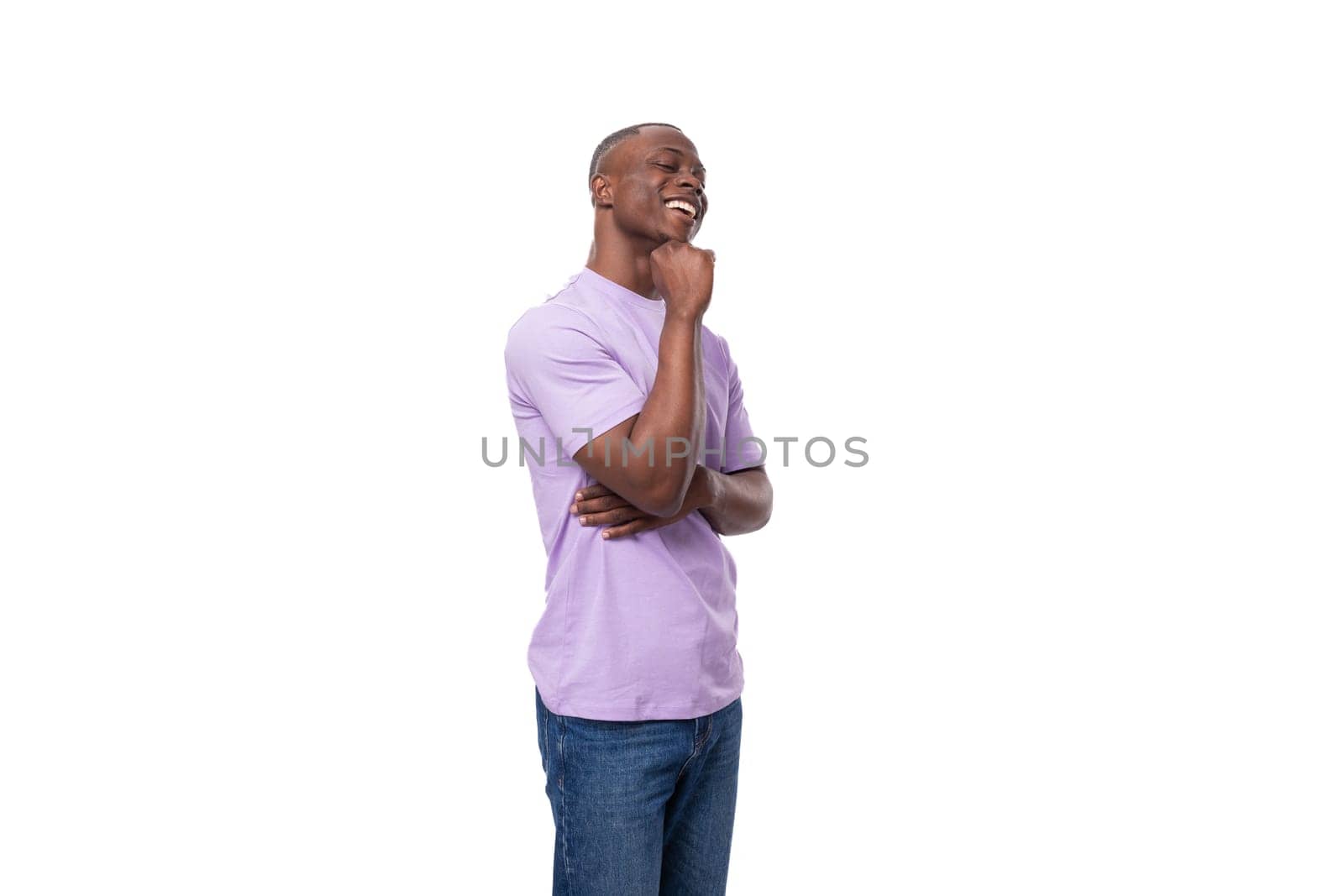 young smart slender American student guy dressed in a light lilac T-shirt and jeans by TRMK