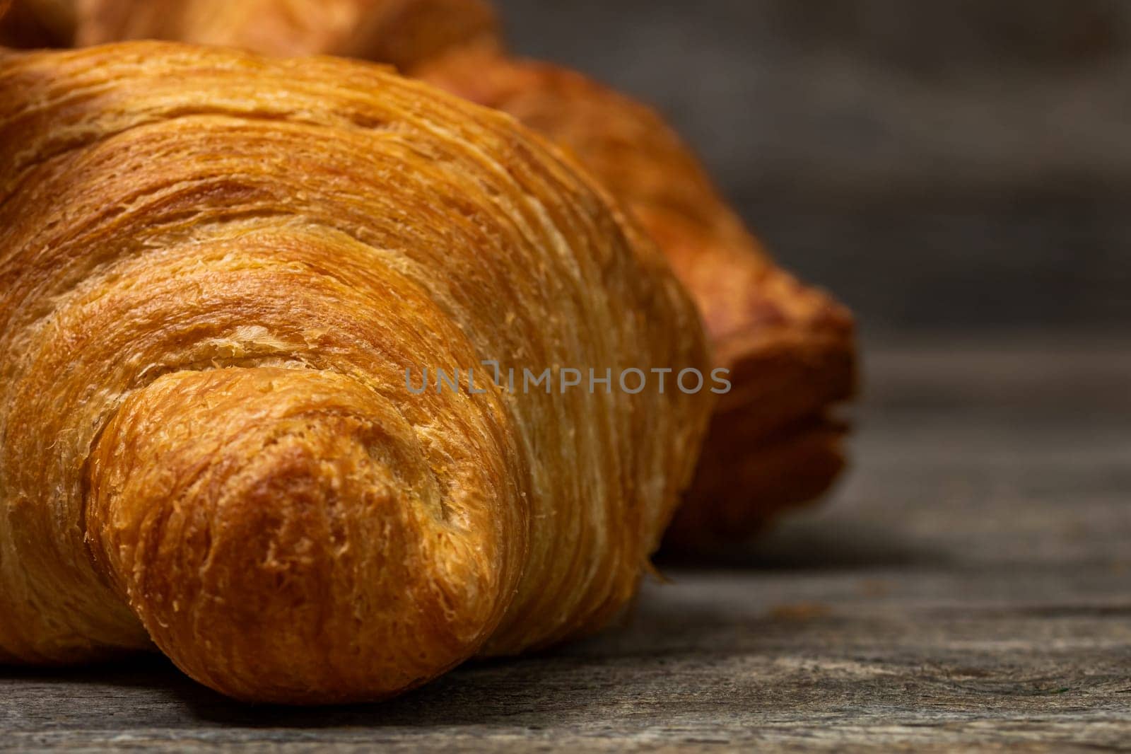 Fresh and delicious croissants isolated. French breakfast concept. by vladispas