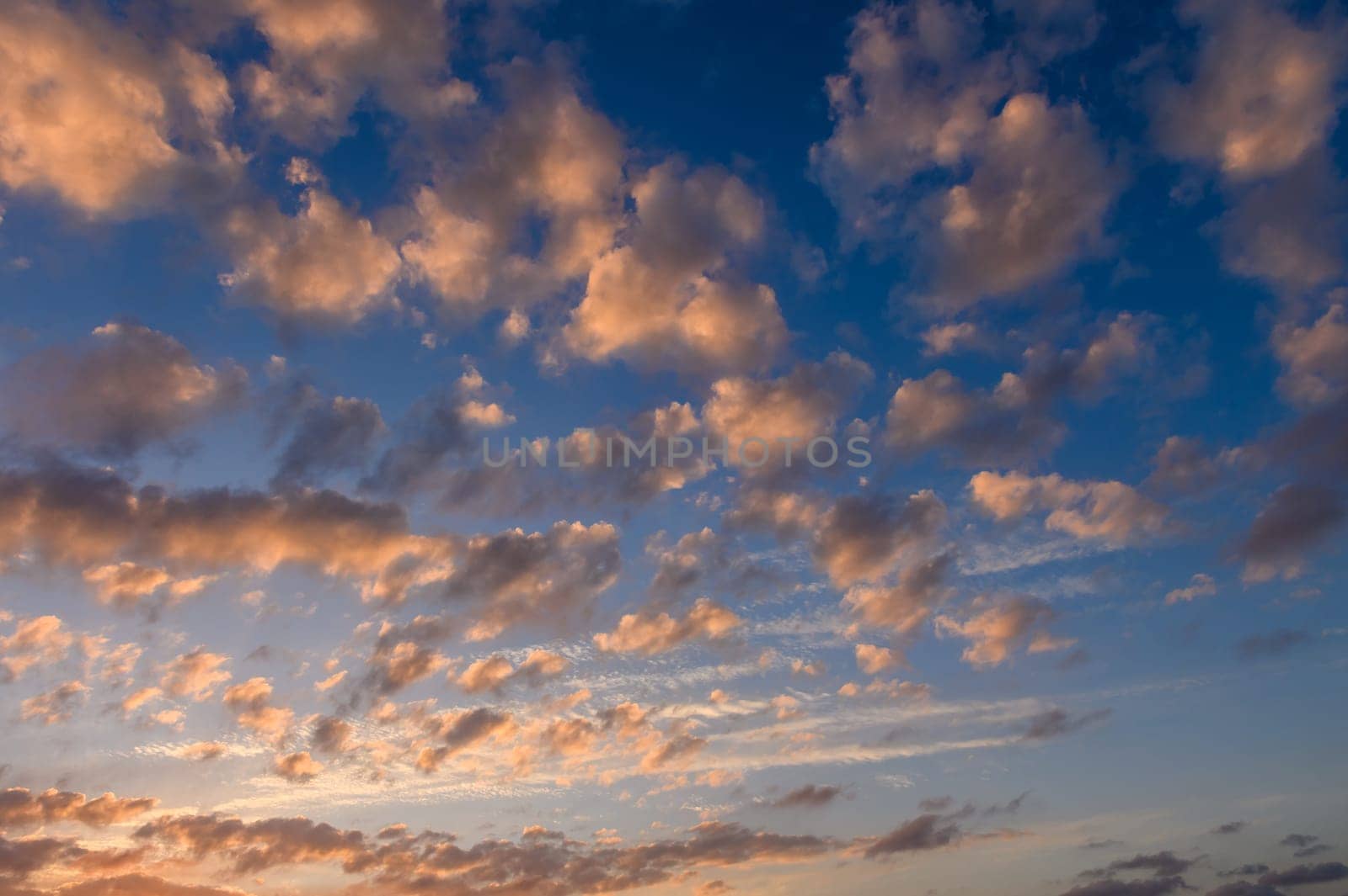 beautiful peach colored clouds over the Mediterranean Sea by Mixa74