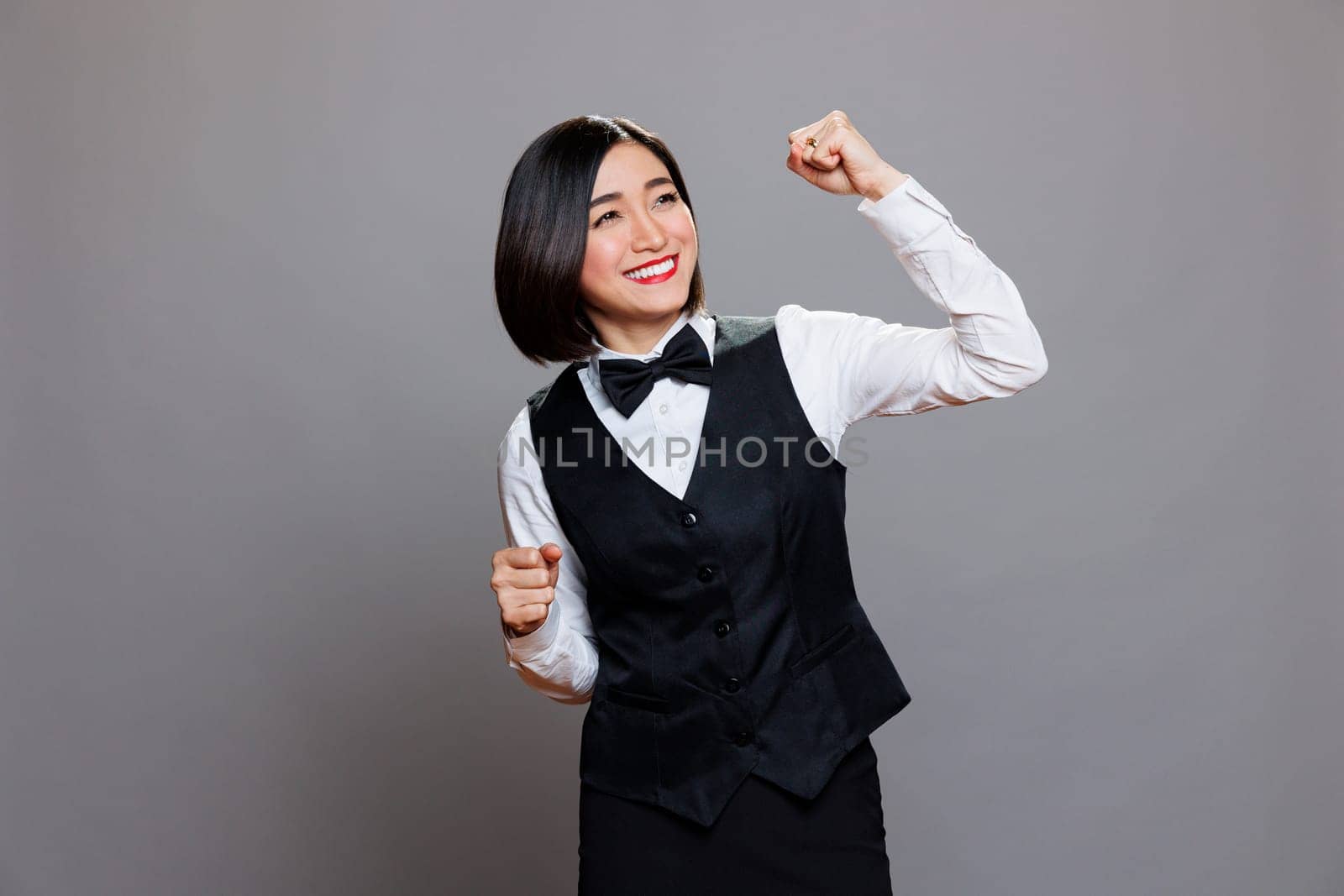 Waitress dancing with joyful expression by DCStudio