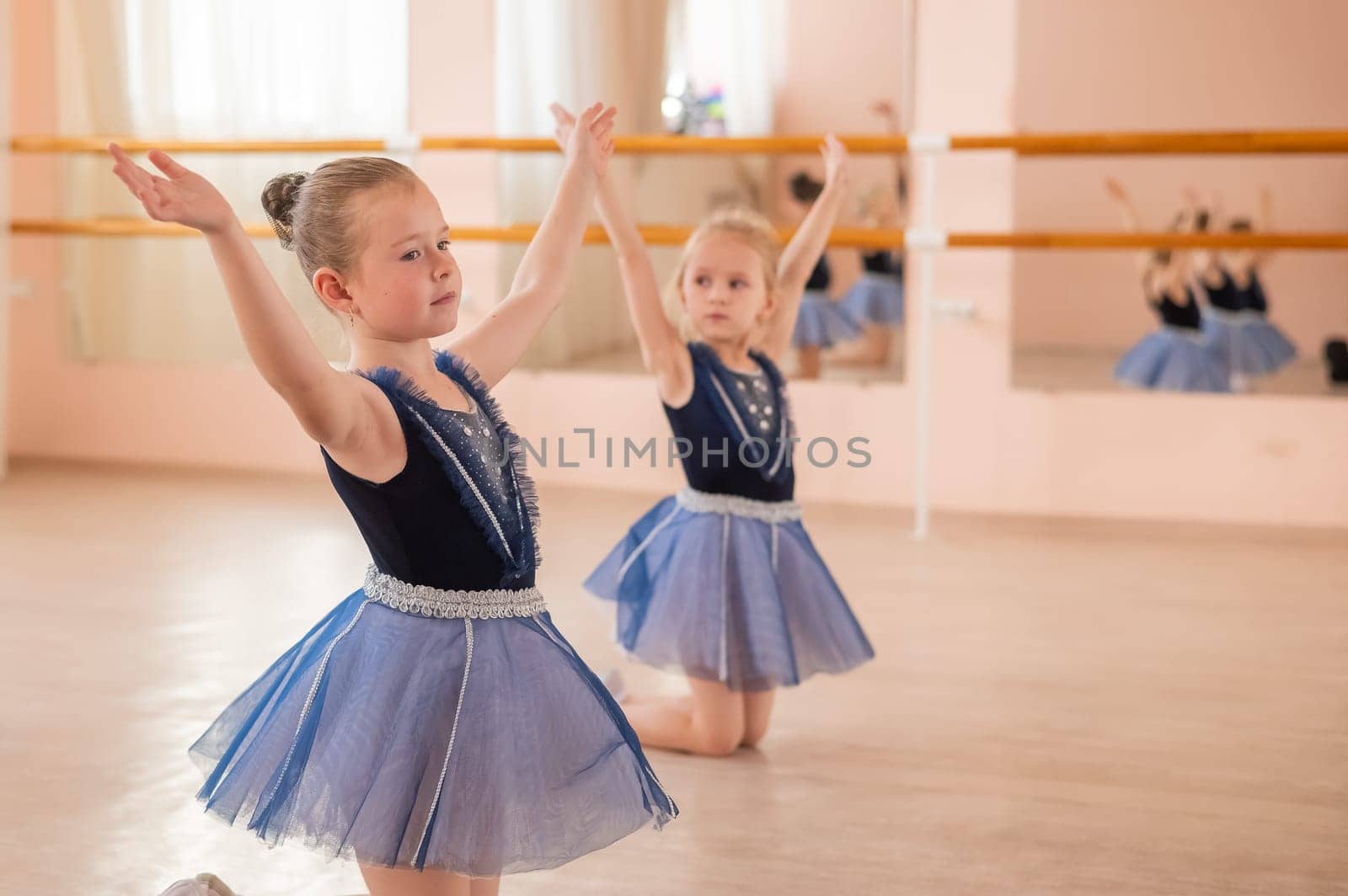 Little ballerinas perform at a dance school
