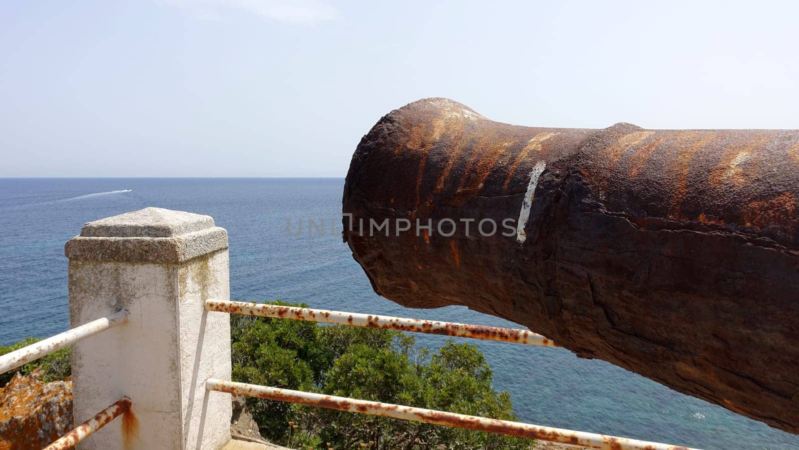 Ancient cannon on one of the Asinara sea viewpoints in Sardinia, Italy. by Jamaladeen