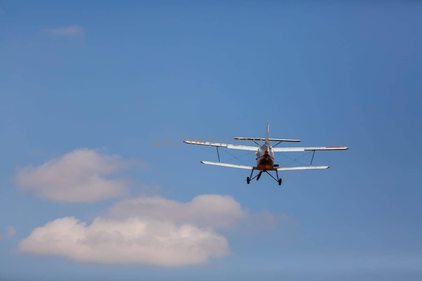 Small light airplane flight on the airport field