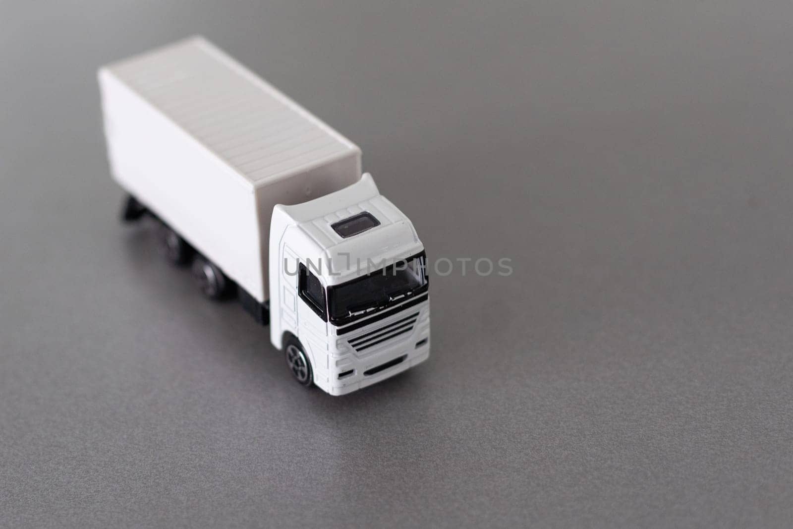 White cargo delivery truck miniature isolated on white background with clipping path by Andelov13