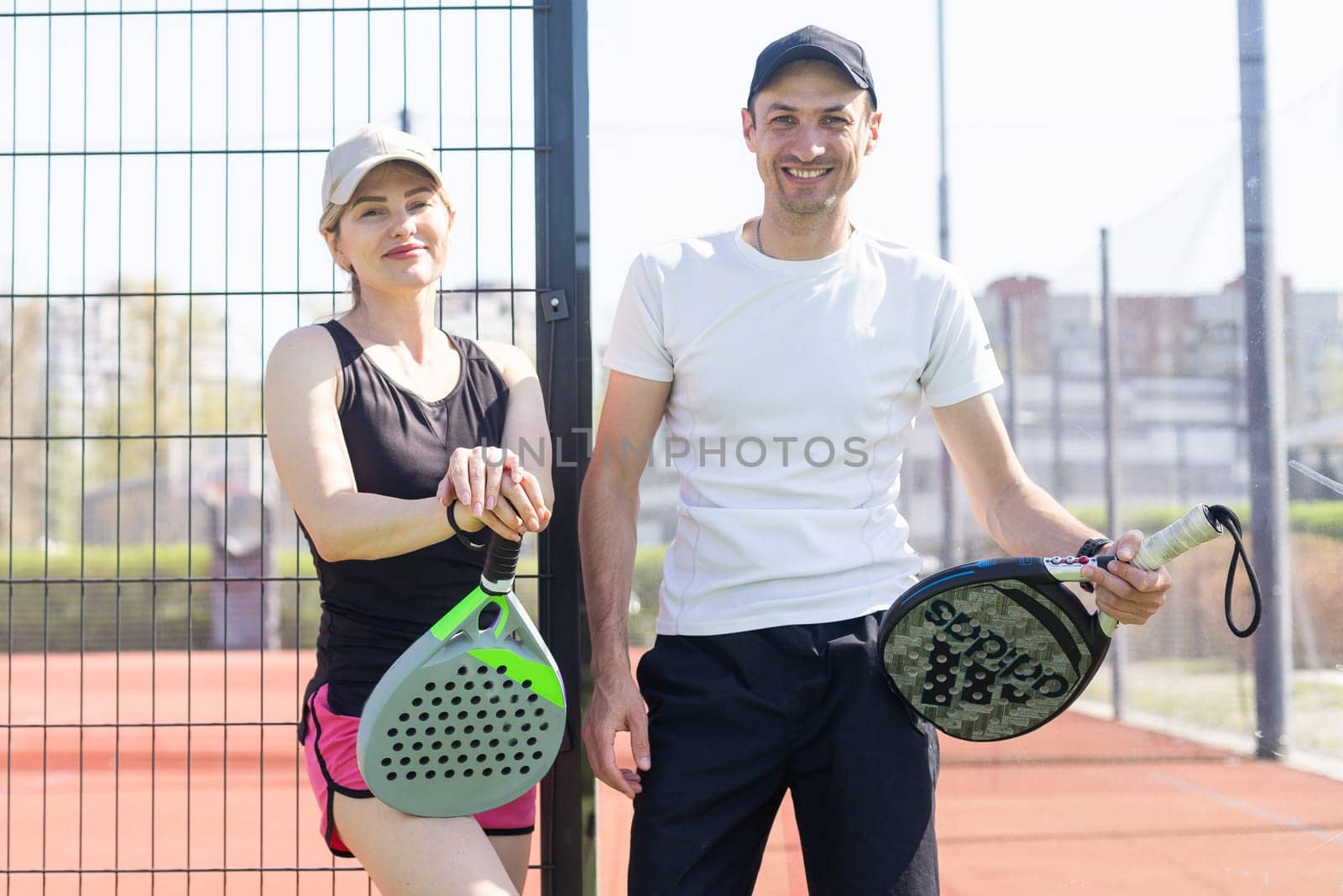 Padel lesson with a coach, personalized instruction in a supportive environment. High quality photo