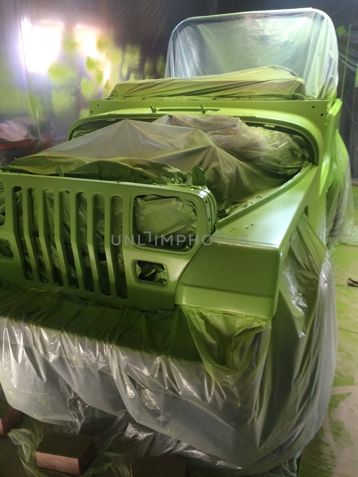 Auto Body Work, Lime Green Paint Job, Square Headlights, 1990s Vehicle . High quality photo