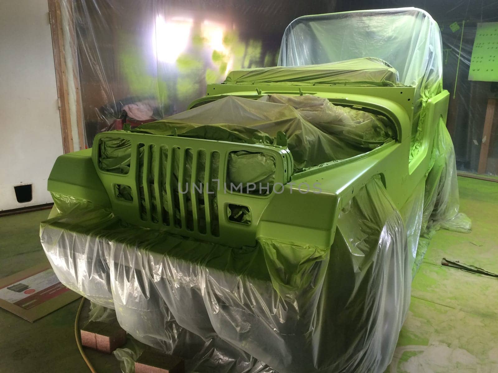 Front View, Auto Body Restoration, Lime Green Paint Job, 1990s Vehicle . High quality photo