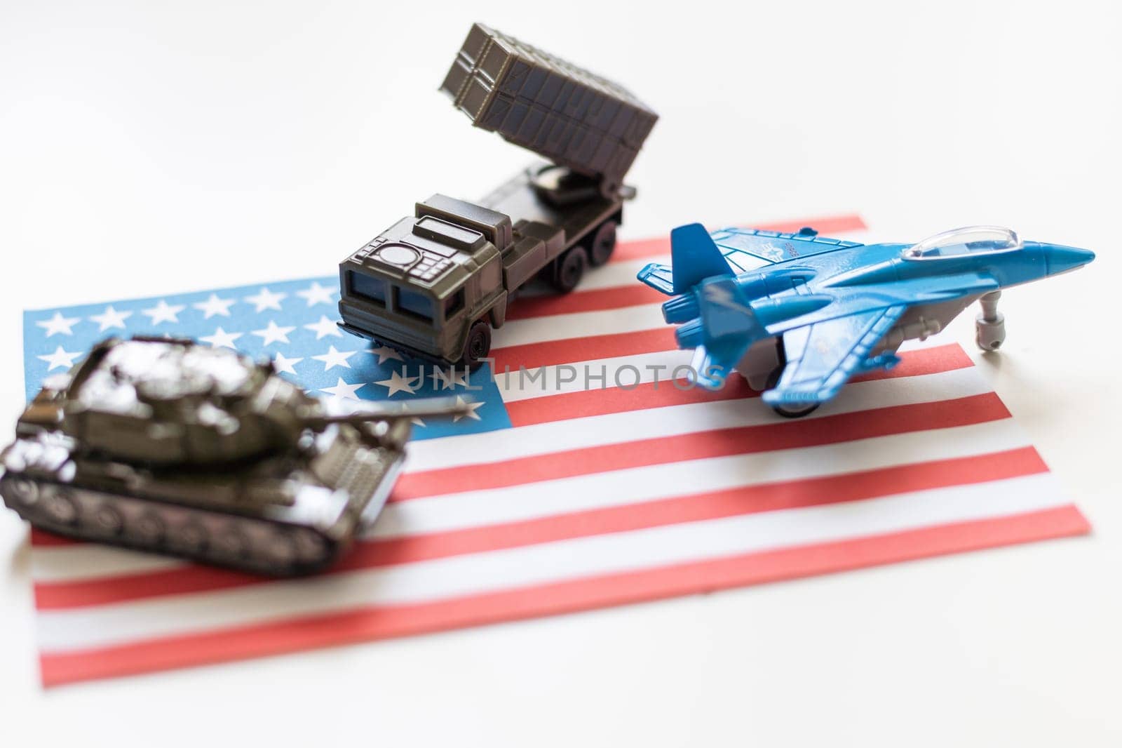 USA flag image photo with a combat plane, khaki green tank and military car standing on american flag by Andelov13