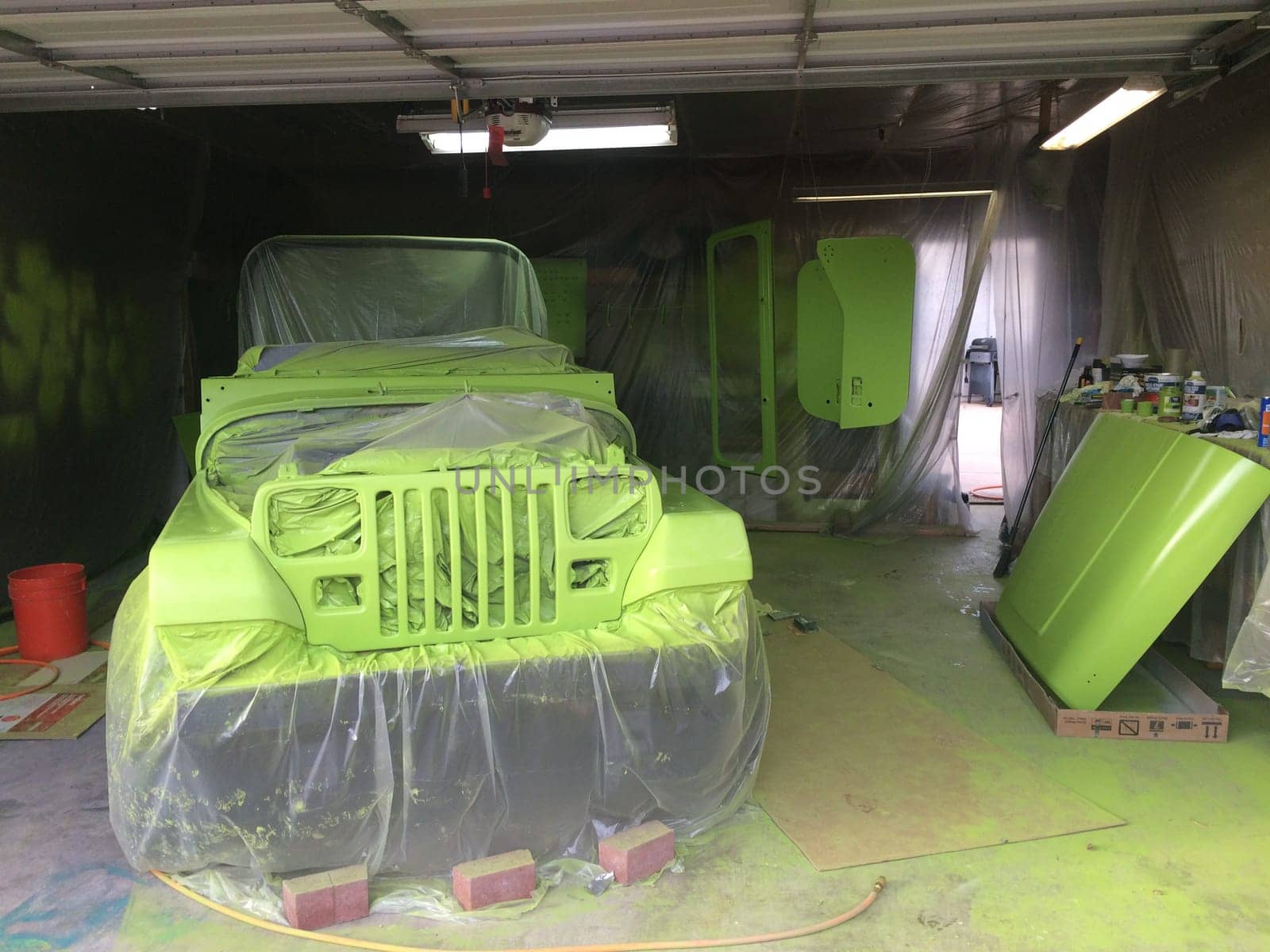 Repainting my 4x4 in the Garage, Lime Green Paint Job, 1990s Vehicle by grumblytumbleweed