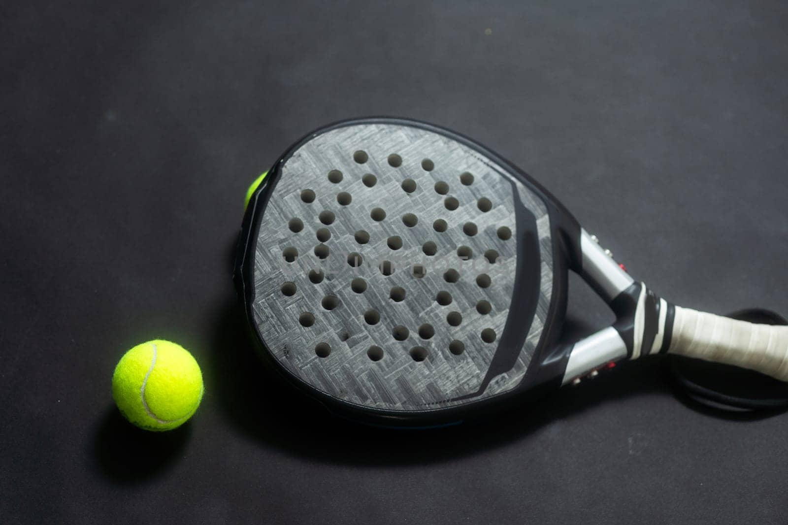 Isolated paddle tennis objects black background by Andelov13
