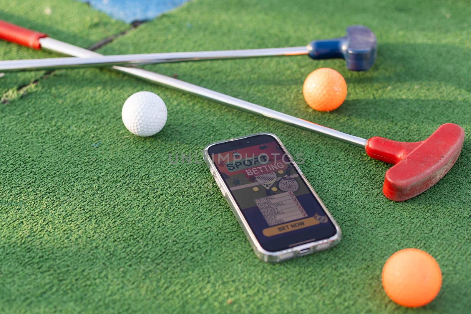 mini golf sports betting on a smartphone. High quality photo