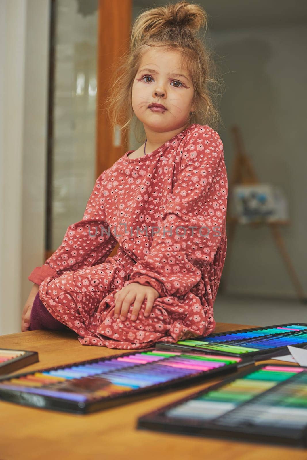 Charming child made makeup with felt-tip pens at home by Viktor_Osypenko
