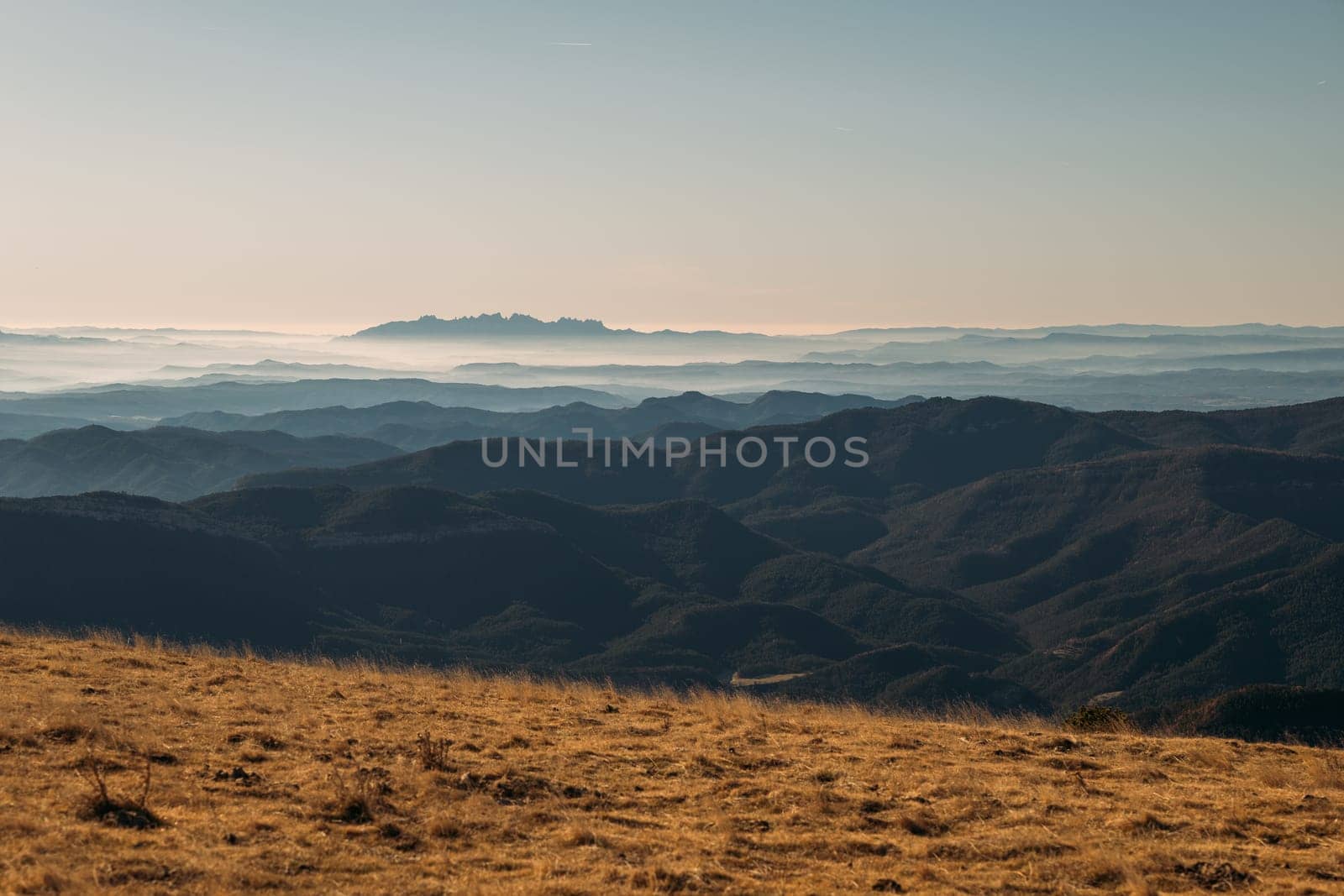 Early Morning Hues Painting a Tranquil Mountain Range by apavlin