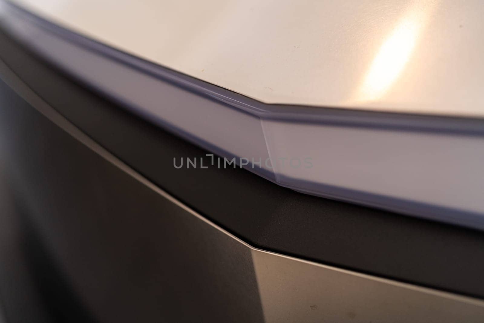 Close-up View of Tesla Cybertruck Sleek Headlight Design by arinahabich